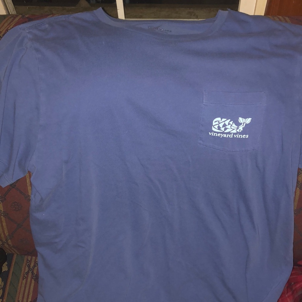 Large vineyard vine shirt.